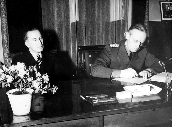 Germany's Foreign Minister Joachim Von Ribbentrop, right, and Lithuania's Foreign Minister Juozas Urbšys sign the agreement to cede Memel to Germany, in Berlin, March 22, 1939 Germany's Foreign Minister Joachim Von Ribbentrop, right, and Lithuania's Foreign Minister Juozas Urbšys sign the agreement to cede Memel to Germany, in Berlin, March 22, 1939